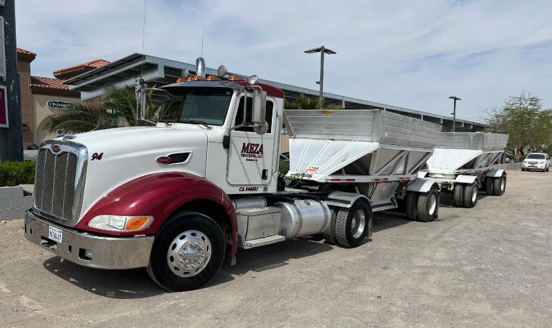 Meza Trucking hauling and waste removal services